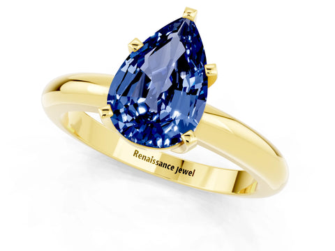 Yellow gold Pear Cut Blue Sapphire Solitaire Engagement Ring with Round Band and Four-Prong Setting_1