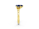Yellow gold Pear Cut Blue Sapphire Solitaire Engagement Ring with Round Band and Four-Prong Setting_2
