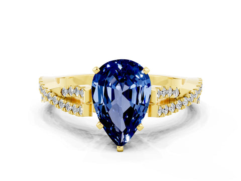 Yellow gold Pear Cut Blue Sapphire Solitaire Engagement Ring with Twisted Pavé Band and Four-Prong Setting