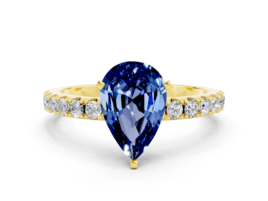 Yellow gold Pear Cut Blue Sapphire Solitaire Pavé Band with Four-Prong Setting