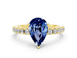 Yellow gold Pear Cut Blue Sapphire Solitaire Pavé Band with Four-Prong Setting