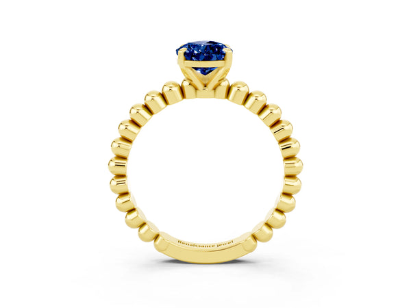 Yellow gold Pear Cut Blue Sapphire Solitaire Ring with Beaded Band and Prong Setting