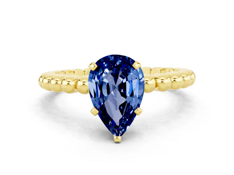 Yellow gold Pear Cut Blue Sapphire Solitaire Ring with Beaded Band and Prong Setting