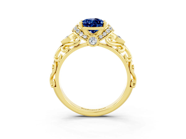 Yellow gold Pear Cut Blue Sapphire Solitaire Ring with Filigree Band and Four-Prong Setting