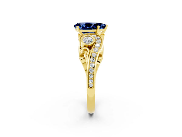 Yellow gold Pear Cut Blue Sapphire Solitaire Ring with Milgrain Pavé Band and Four-Prong Setting