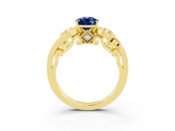 Yellow gold Pear Cut Blue Sapphire Solitaire Ring with Milgrain Pavé Band and Four-Prong Setting