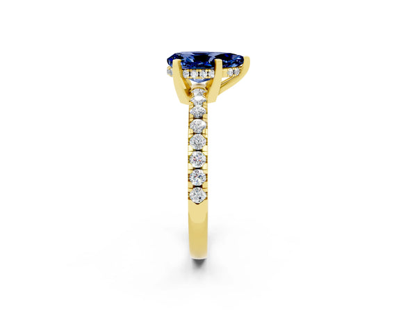 Yellow gold Pear Cut Blue Sapphire Solitaire Ring with Round  Pavé Band and Four-Prong Setting