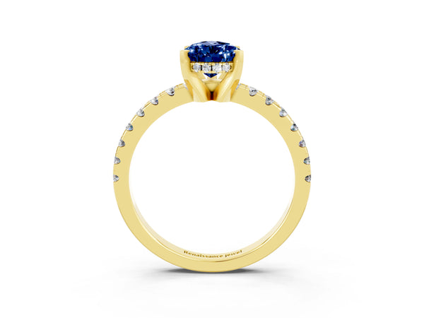 Yellow gold Pear Cut Blue Sapphire Solitaire Ring with Round  Pavé Band and Four-Prong Setting