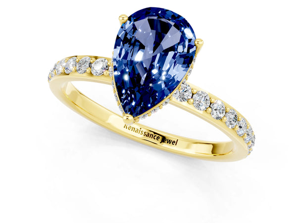 Yellow gold Pear Cut Blue Sapphire Solitaire Ring with Pavé Band and Hidden Halo
