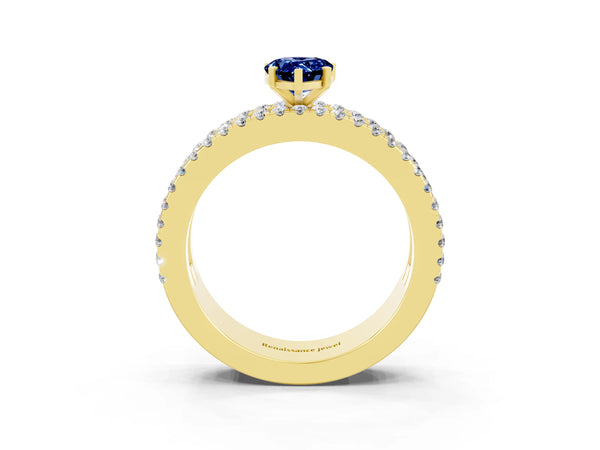 Yellow gold Pear Cut Blue Sapphire Solitaire Ring with Pavé and Channel Set Band