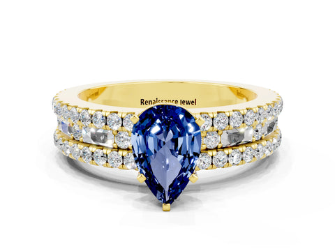 Yellow gold Pear Cut Blue Sapphire Solitaire Ring with Pavé and Channel Set Band