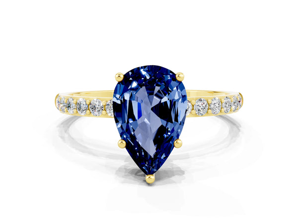 Yellow gold Pear Cut Blue Sapphire Solitaire Ring with Round  Pavé Band and Prong Setting