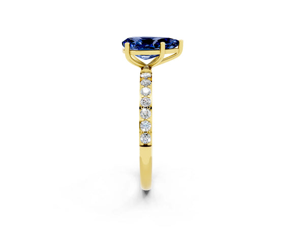 Yellow gold Pear Cut Blue Sapphire Solitaire Ring with Round  Pavé Band and Prong Setting