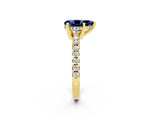 Yellow gold Pear Cut Blue Sapphire Solitaire Ring with Round  Pavé Band and Four-Prong Setting_38