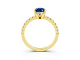 Yellow gold Pear Cut Blue Sapphire Solitaire Ring with Round  Pavé Band and Four-Prong Setting_39