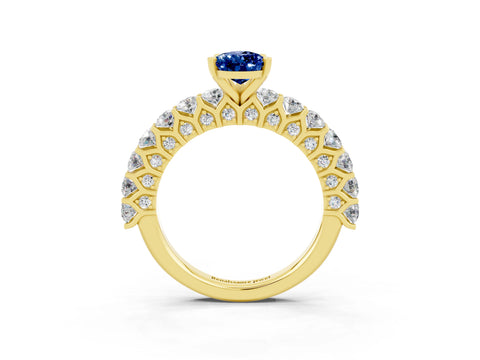 Yellow gold Pear Cut Blue Sapphire Solitaire Ring with Shared Prong Pavé Band and Four-Prong Setting_15