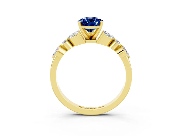 Yellow gold Pear Cut Blue Sapphire Solitaire Ring with Side Stones and Four-Prong Setting