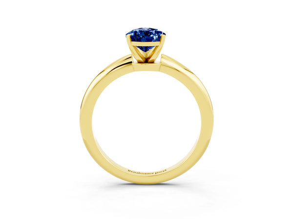 Yellow gold Pear Cut Blue Sapphire Solitaire Ring with Six-Prong Setting and Classic Band