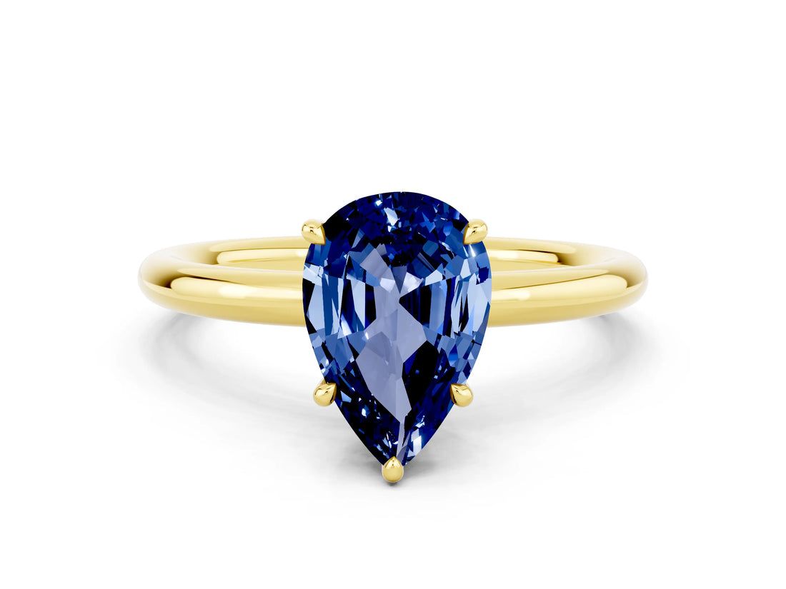 Yellow gold Pear Cut Blue Sapphire Solitaire Ring with Thin Band and Four-Prong Setting_12