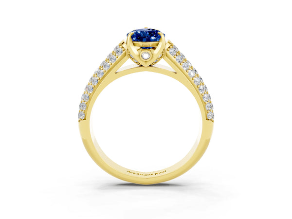 Yellow gold Pear Cut Blue Sapphire Solitaire Ring with Three-Row Pavé Band and Four-Prong Setting