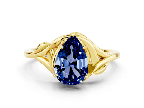 Yellow gold Pear Cut Blue Sapphire Solitaire Ring with Twist Band and Four-Prong Setting_24