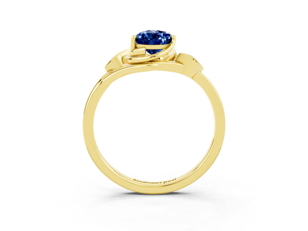Yellow gold Pear Cut Blue Sapphire Solitaire Ring with Twist Band and Four-Prong Setting