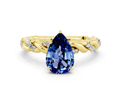 Yellow gold Pear Cut Blue Sapphire Solitaire Ring with Twisted Band and Pavé Accents