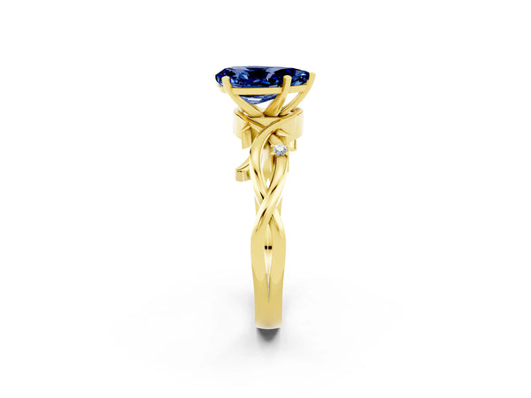 Yellow gold Pear Cut Blue Sapphire Solitaire Ring with Twisted Band and Prong Setting