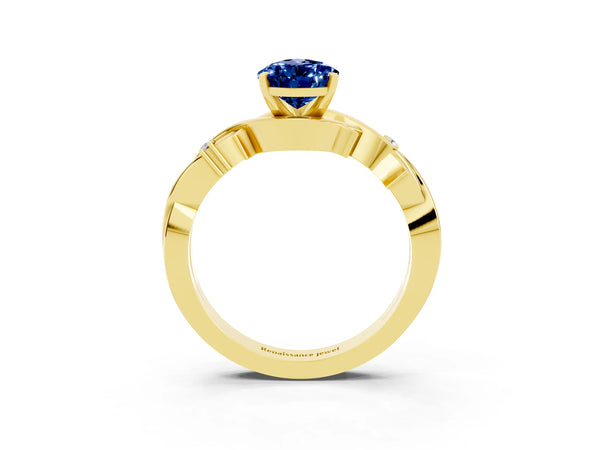 Yellow gold Pear Cut Blue Sapphire Solitaire Ring with Twisted Band and Prong Setting