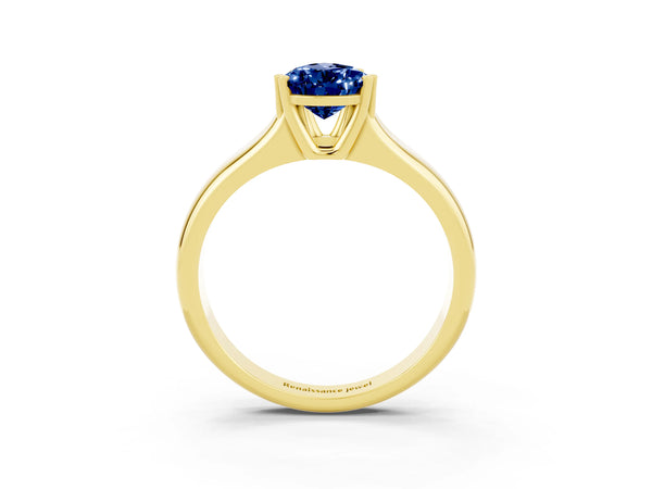 Yellow gold Pear Cut Blue Sapphire Solitaire Ring with Wide Band and Prong Setting