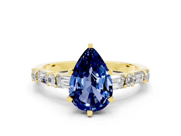 Yellow gold Pear Cut Blue Sapphire Solitaire with Side Baguettes and Channel Set Band