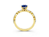Yellow gold Pear Cut Blue Sapphire Solitaire with Side Stones on a Pavé Band and Four-Prong Setting_3