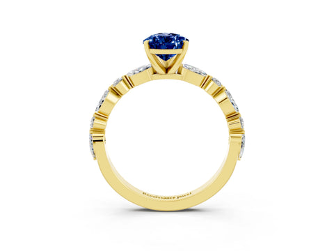Yellow gold Pear Cut Blue Sapphire Solitaire with Side Stones on a Pavé Band and Four-Prong Setting_3