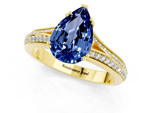 Yellow gold Pear Cut Blue Sapphire Split Shank Engagement Ring with Pavé Band