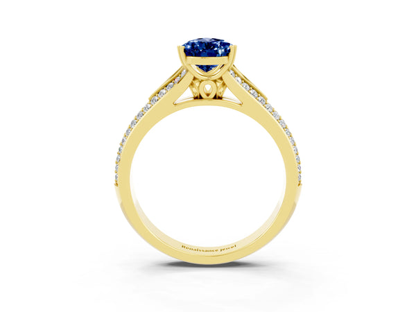 Yellow gold Pear Cut Blue Sapphire Split Shank Engagement Ring with Pavé Band
