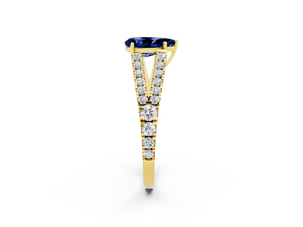 Yellow gold Pear Cut Blue Sapphire Split Shank Pavé Engagement Ring with Four-Prong Setting