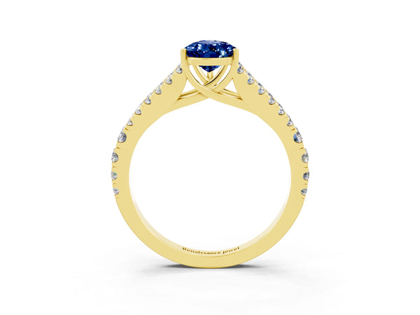Yellow gold Pear Cut Blue Sapphire Split Shank Pavé Engagement Ring with Four-Prong Setting