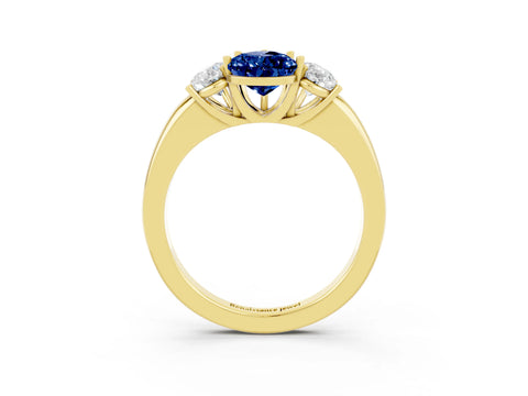 Yellow gold Pear Cut Blue Sapphire Three-Stone Ring with Four-Prong Setting and Classic Band_3