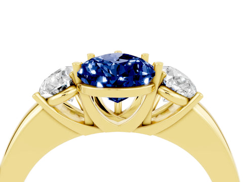 Yellow gold Pear Cut Blue Sapphire Three-Stone Ring with Four-Prong Setting and Classic Band_4