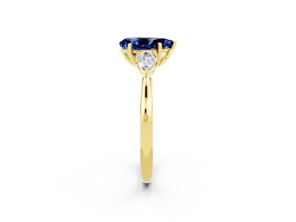 Yellow gold Pear Cut Blue Sapphire Three-Stone Ring with Pear  Side Stones and Prong Setting