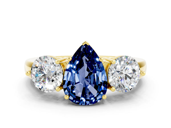 Yellow gold Pear Cut Blue Sapphire Three-Stone Ring with Prong Setting and Classic Band