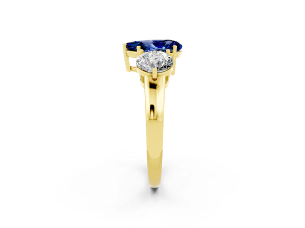 Yellow gold Pear Cut Blue Sapphire Three-Stone Ring with Prong Setting and Classic Band