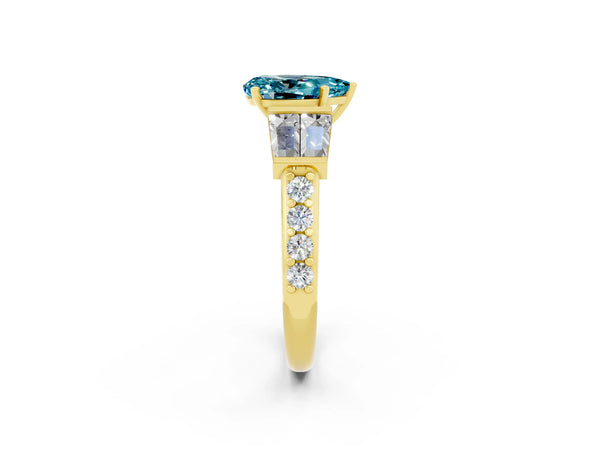 Yellow gold Pear Cut Blue Topaz Engagement Ring with Baguette Side Stones and Channel Set Band