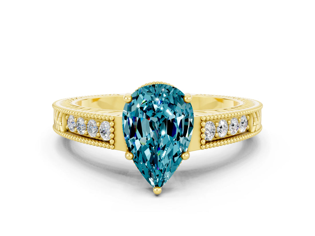 Yellow gold Pear Cut Blue Topaz Engagement Ring with Milgrain Channel Set Band and Prong Setting