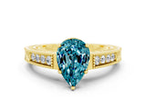 Yellow gold Pear Cut Blue Topaz Engagement Ring with Milgrain Channel Set Band and Prong Setting