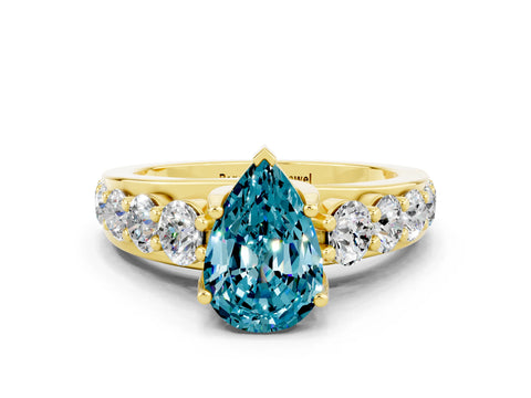 Yellow gold Pear Cut Blue Topaz Engagement Ring with Pavé Band and Four-Prong Setting
