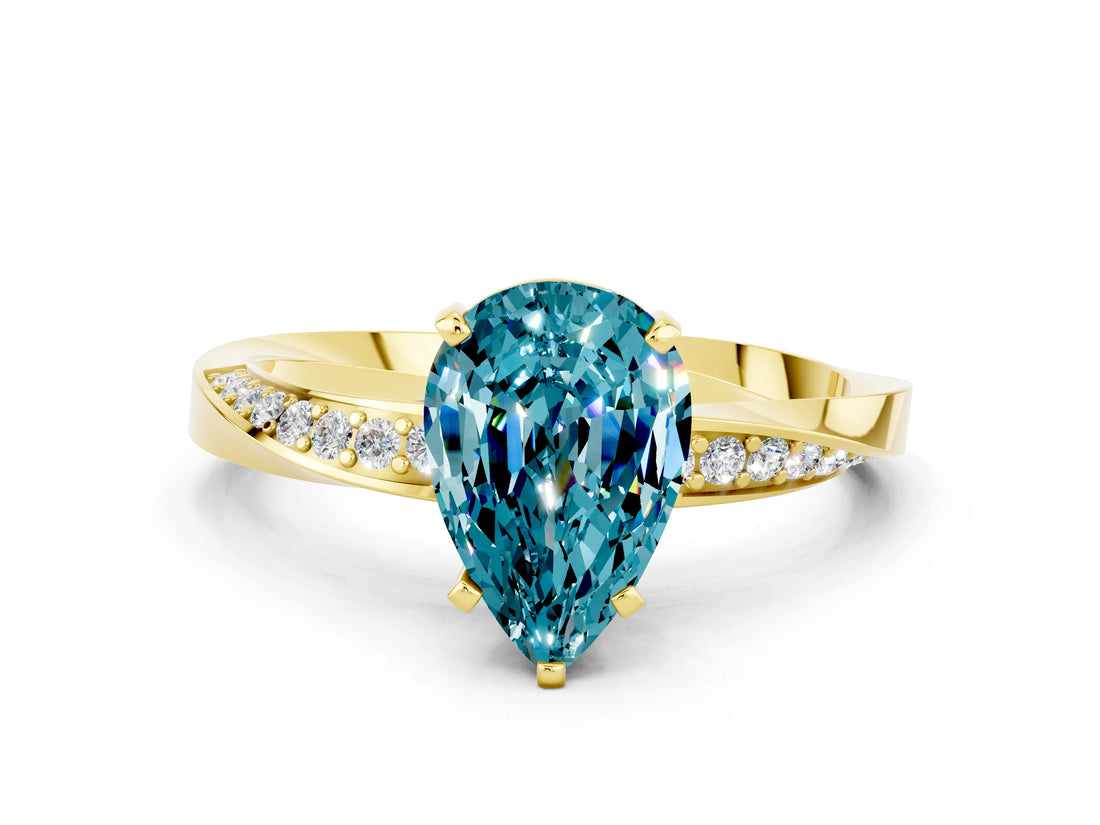 Yellow gold Pear Cut Blue Topaz Engagement Ring with Side Stone Accents and Four-Prong Setting_27