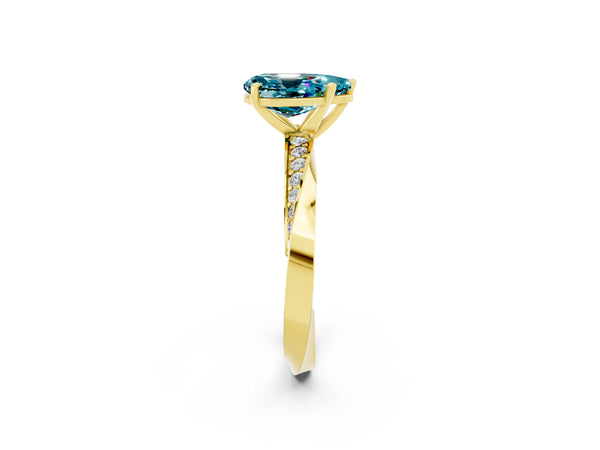 Yellow gold Pear Cut Blue Topaz Engagement Ring with Side Stone Accents and Four-Prong Setting