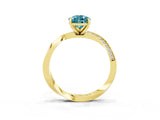 Yellow gold Pear Cut Blue Topaz Engagement Ring with Side Stone Accents and Four-Prong Setting_63