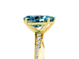 Yellow gold Pear Cut Blue Topaz Engagement Ring with Side Stone Accents and Four-Prong Setting_65